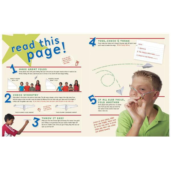 Interior spread of Klutz Book of Paper Airplanes showing folding instructions and a child holding a paper airplane