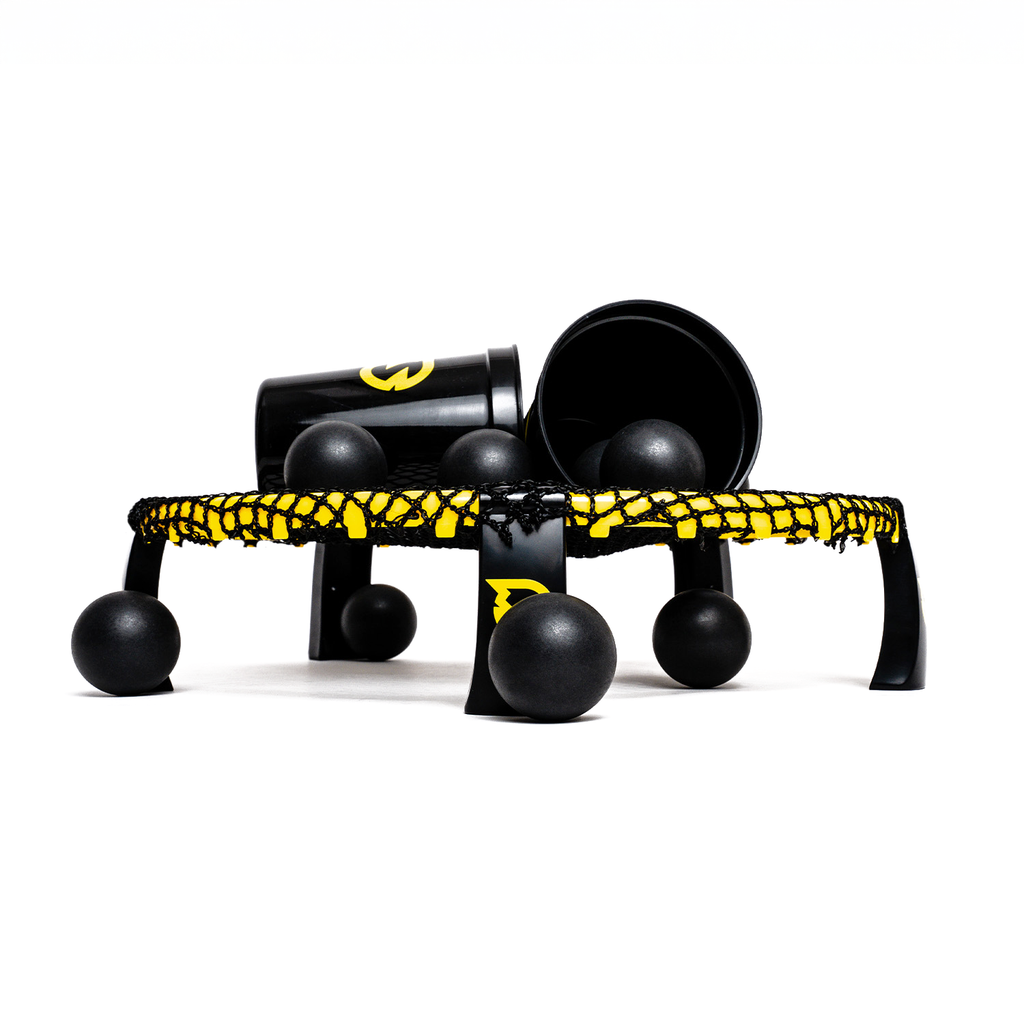 Spikepong mini game set with black and yellow net, balls, and cups on white background.