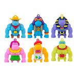 Six colorful Funkee Monkee Charmlets toy figures in various costumes including cowboy, hippie, pharaoh, hula, artist, and ...