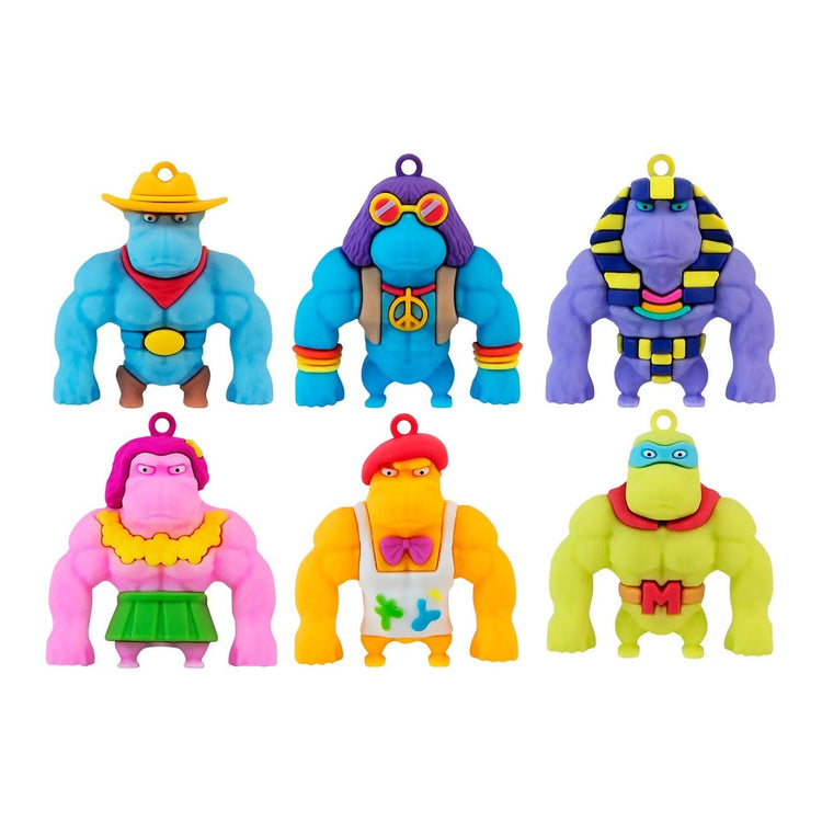 Six colorful Funkee Monkee Charmlets toy figures in various costumes including cowboy, hippie, pharaoh, hula, artist, and ...