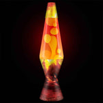 Glowing 14.5-inch erupting crater lava lamp with yellow blobs in red liquid on dark background