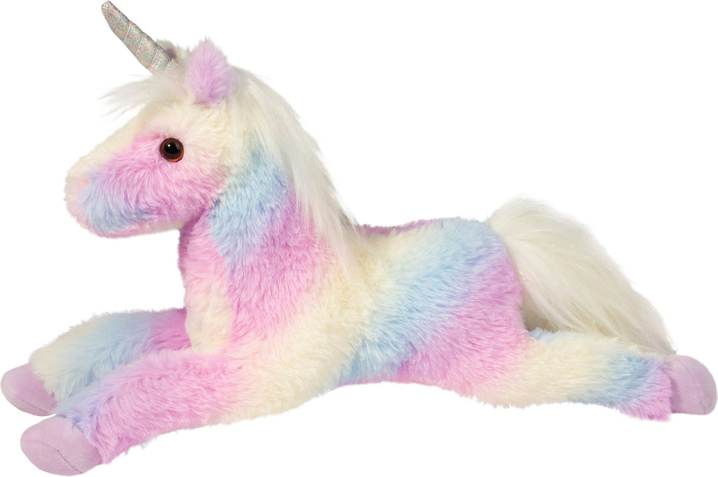 Anita Rainbow Unicorn plush toy lying down with pastel rainbow fur and glittery horn