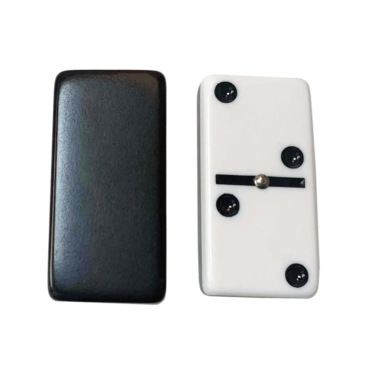 Double 6 club size dominoes showing black back and white face with black dots