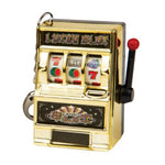 Miniature gold Lucky Slot Casino slot machine toy with pull handle and spinning reels keychain